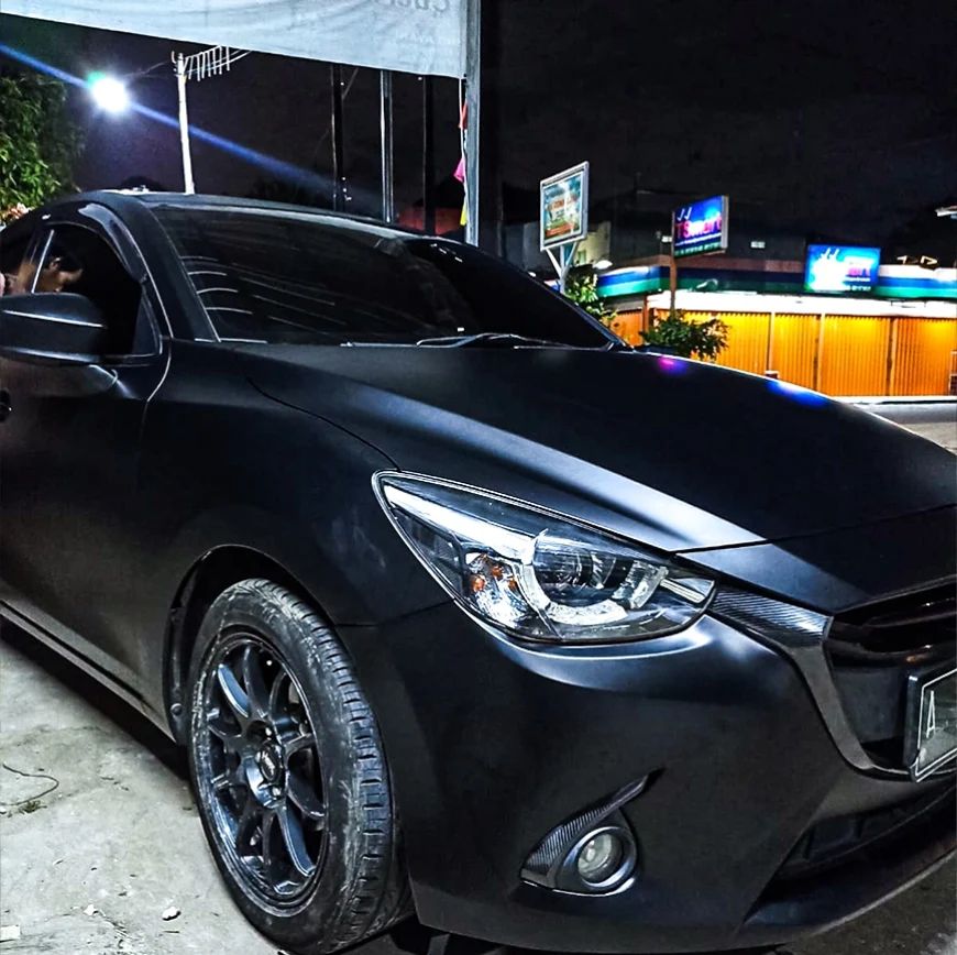 Jasa Wrapping Stiker Mazda 2 Menggunakan Bahan Maxdecal